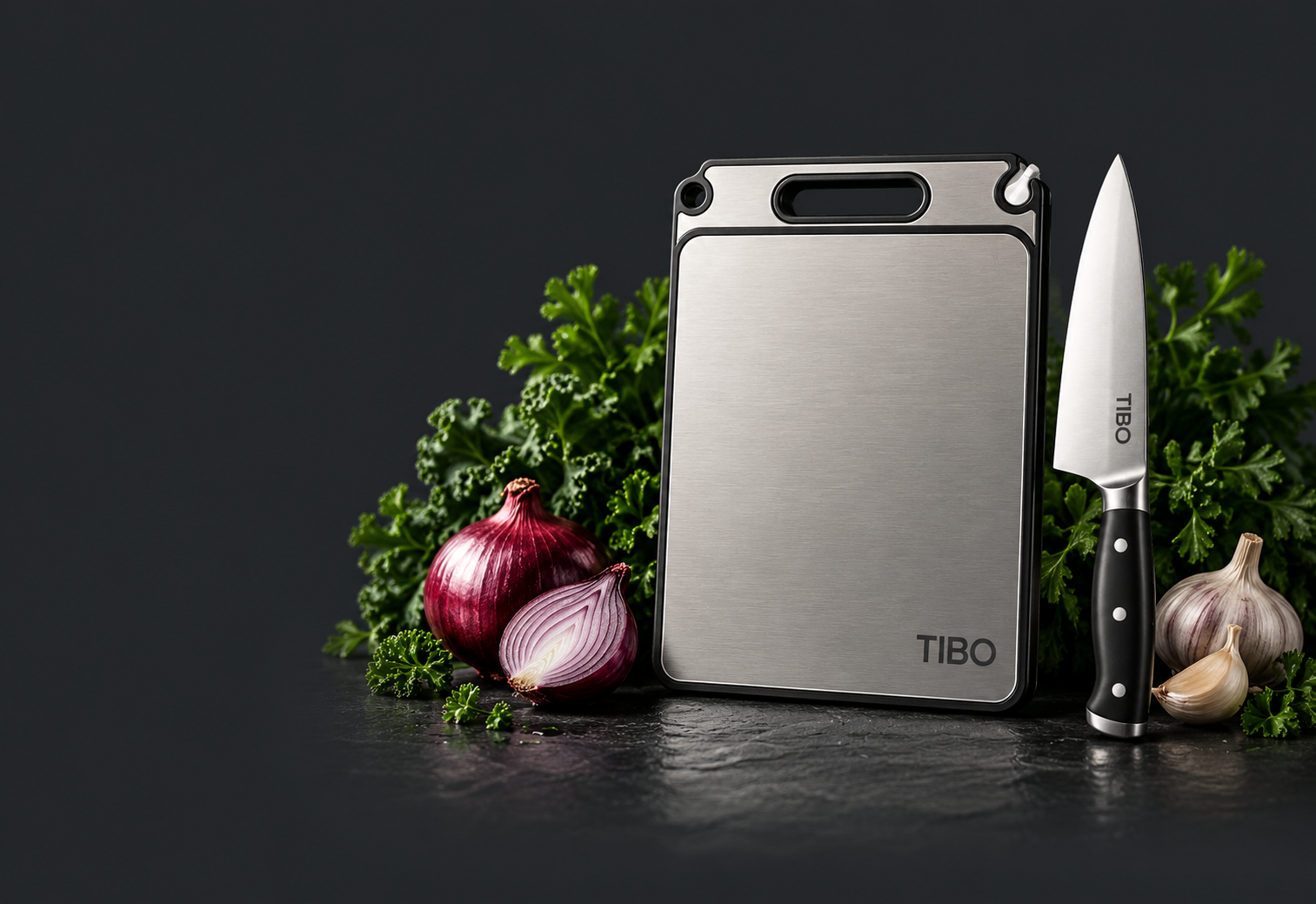 TIBO board with the chef’s knife, fresh herbs, onion and garlic